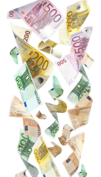 istock Many euro banknotes flying on white background 1741384836