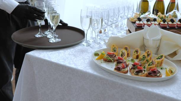 istock Snack table. Canape with vegetables and cheese. Festive table with sweet snacks. Nicely decorated buffet table. Table with salads, appetizers at a festive event 1741400176