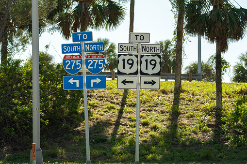 Blue directional road sign indicating direction to I-275 freeway interstate highway serving the Tampa Bay area in Florida.