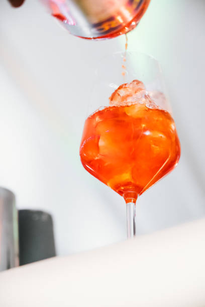 istock Process of preparing an spritz wine cocktail prosecco close-up at a bar counter 1741436029