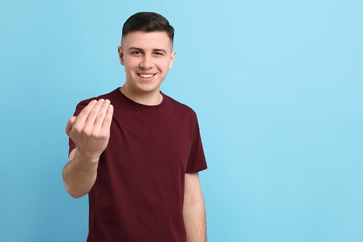 Some Man's Inviting Handsome Man Inviting To Come In Against Light Blue Background Space ...