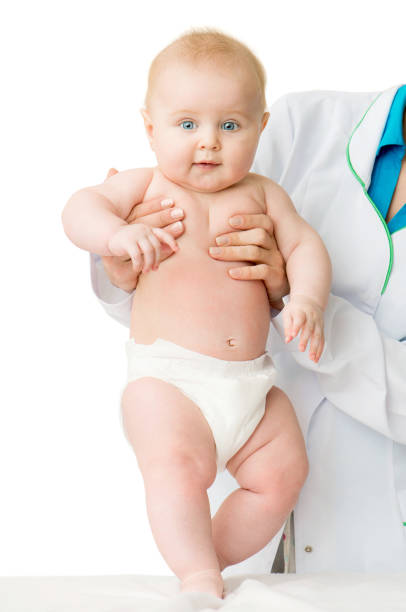 istock Doctor with cute baby 1741445841