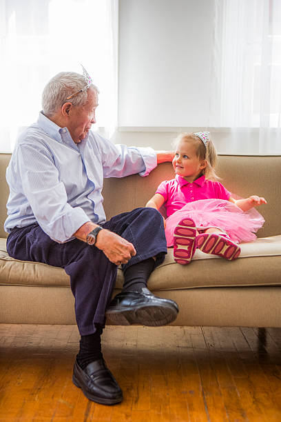 istock Grandfather and grandaughter playing Princess 174146879