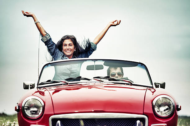 istock Happy people in a cabriolet 174149543