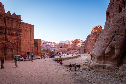 Wadi Musa, November 2, 2021: Streets of facades in the historic and archaeological city of Petra against blue sky