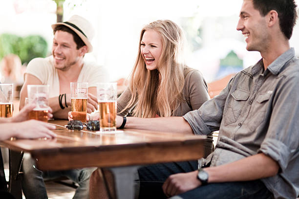 istock Young people drinking beer outdoors 174150508