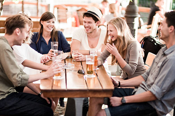 istock Young people drinking beer outdoors 174150545