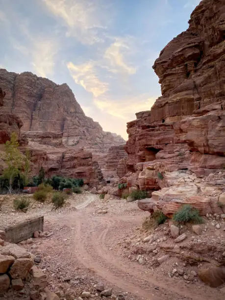 Ad-Deir Trail Monastery Route in the historic and archaeological city of Petra, Jordan against blue sky at sunset