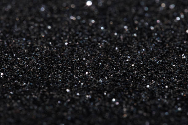 istock Glitter vintage lights background, light silver and black 1741534254