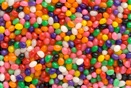 Jellybeans fill the entire frame for a colorful background. Shot can be used as a Vertical or Horizontal.
