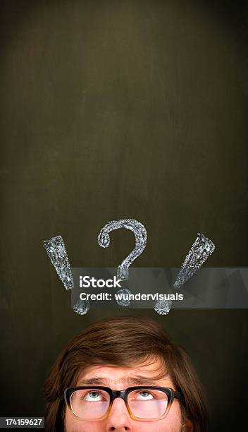 Thinking Man With Question Mark On Blackboard Stock Photo - Download Image Now - Adult, Adults Only, Adversity