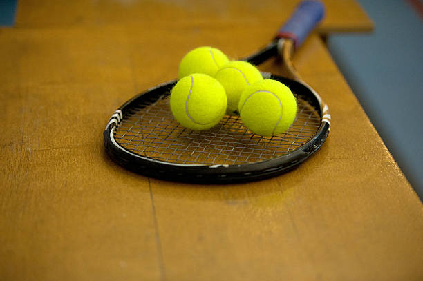 istock Tennis balls lying on a racket 174162140