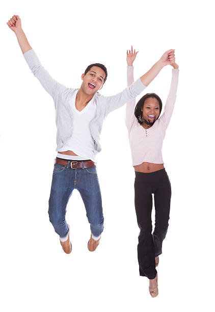 istock Young Couple Jumping In The Air 174162307