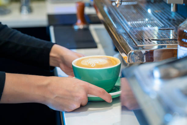 istock barista making a cafe latte 1741625309