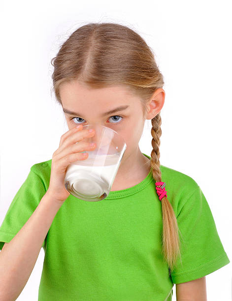 istock Girl drinks milk from a glass 174162676