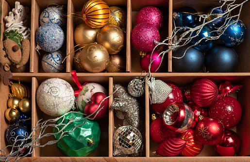Wooden box filled with Christmas decorations