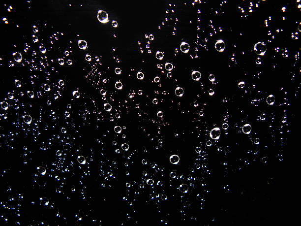 Water drops Water drops texture on a dark window water on black surface stock pictures, royalty-free photos & images