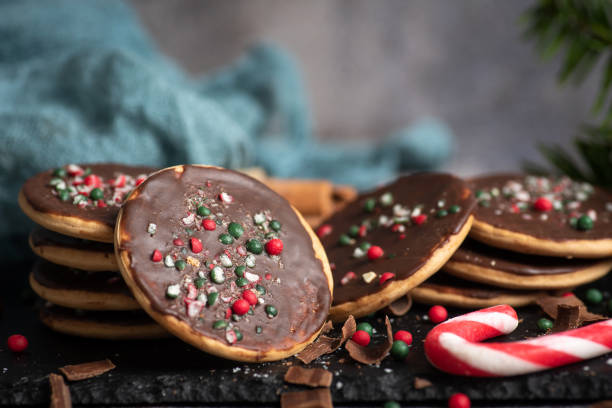 istock Chocolate biscuit sprinkled with Christmas candies 1741672858