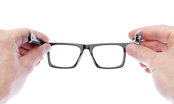 istock Man wearing glasses to improve vision. On a white background. 174168519