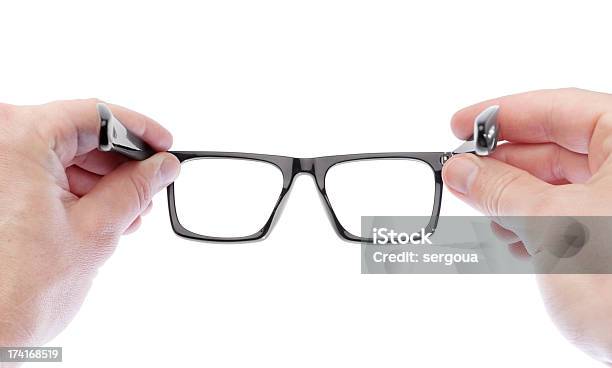 Man Wearing Glasses To Improve Vision On A White Background Stock Photo - Download Image Now