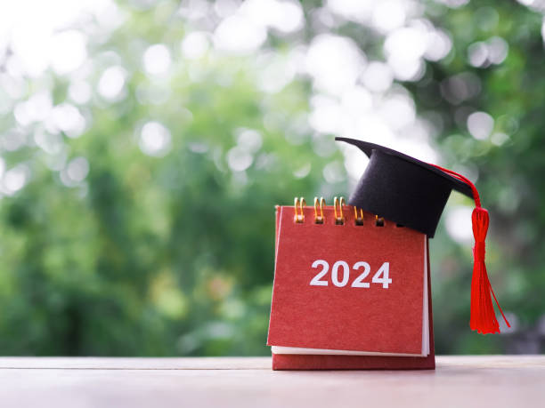 istock Study goals, 2024 Desk calendar with graduation hat. The concept for Resolution, Goal, Action, Planning, and manage time to success graduate in New Year 2024 1741694812