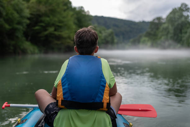istock Father and son kayaking on the river Kolpa 1741710510