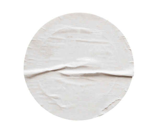 istock Blank white round paper sticker label isolated on white background 1741711091
