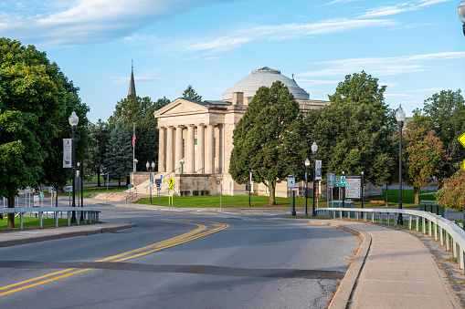 Distant photo of Plattsburgh City Hall from the road. The road, Cumberland ave. takes us to the town hall.