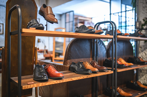 Luxury handcrafted leather shoes for sale in a small boutique for gentlemen. Classic and original designs of oxford shoes to look elegant and stylish with every outfit.