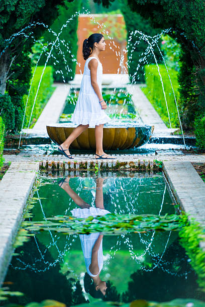 Refreshing in the Alhambra Generalife gardens, Spain stock photo