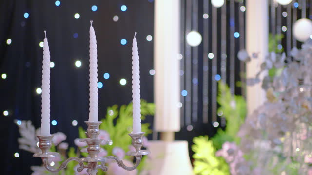 White candles in the wedding reception