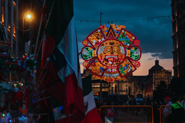 decorations at the entrance to the zocalo in mexico city for the celebration of the independence, view from 20 de noviembre avenue - north american tribal culture photography color image horizontal stock-fotos und bilder