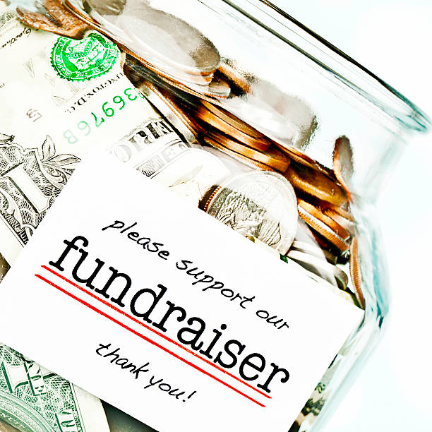 istock Fundraising Jar Filled with American Money 174181426