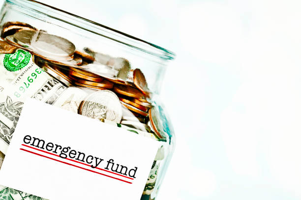 istock Emergency Fund Jar Filled with American Money 174181525