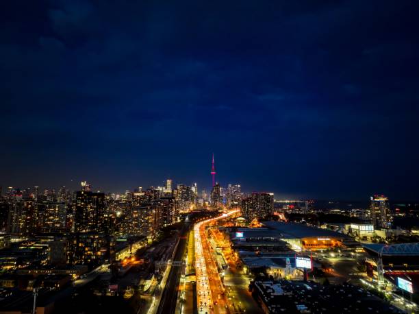 This aerial footage offers a unique perspective of downtown Toronto during the bustling evening rush hour. It showcases the stunning cityscape.