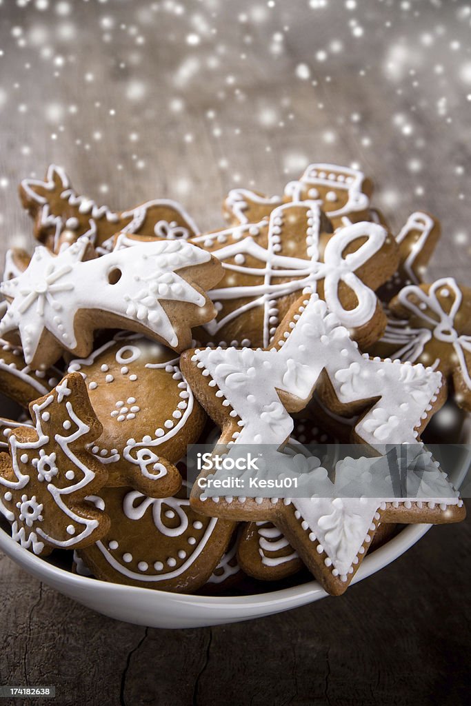 Traditional gingerbread cookies Traditional gingerbread cookies over wooden background Angel Stock Photo