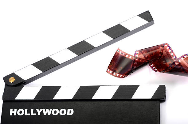 Movie clapper board and film strip