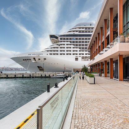 Istanbul, Turkey - May 5, 2023: MSC SPLENDIDA, Large cruise ship docked at terminal of Galataport, a mixed use development located along shore of Bosphorus strait, in Karakoy neighbourhood