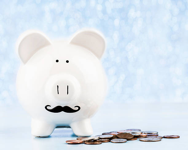 movember salvadanaio a porcellino - fundraiser defocused finance ideas foto e immagini stock