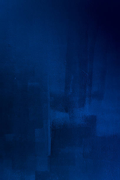 Dark blue brush strokes on wall stock photo