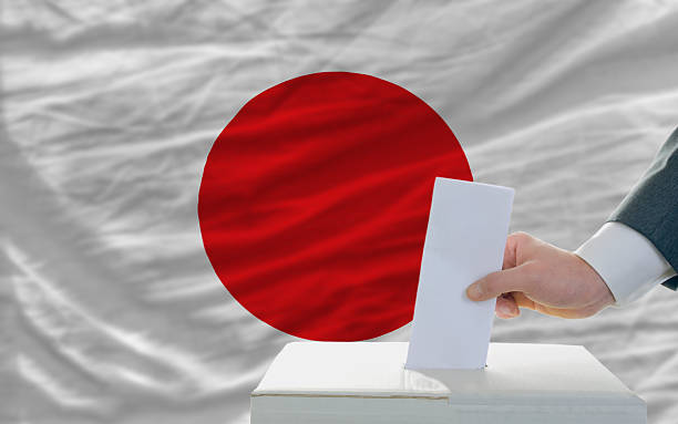 istock man voting on elections in japan 174186025