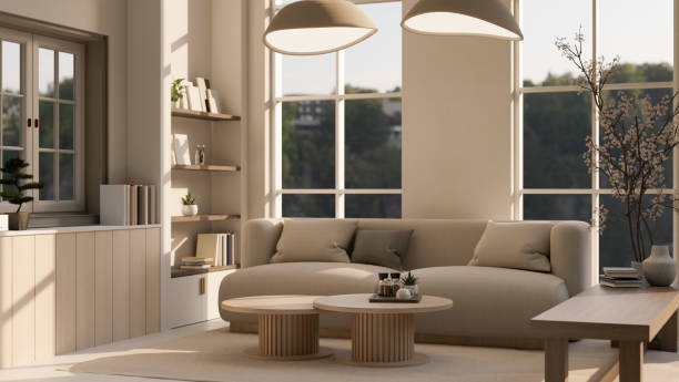 istock A modern, contemporary beige living room with a comfortable couch, a coffee table, and accessories. 1741875587