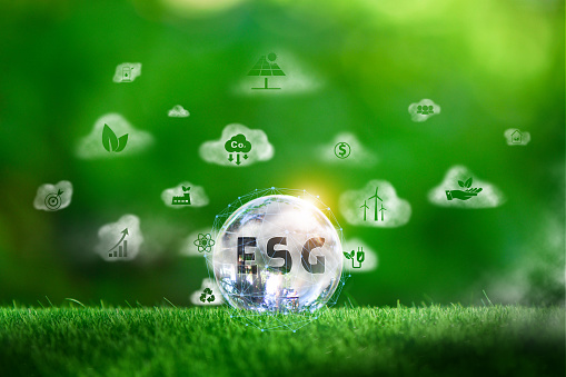 Glass globe in green forest with the icon environment of ESG, co2, circular company, and net zero. Technology Environment, Organization Sustainable development environmental.