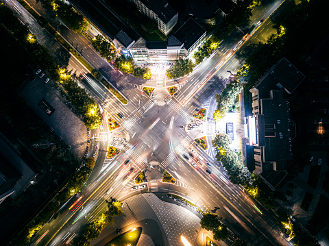 Aerial view of city street intersection at night