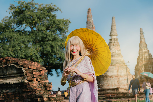 Beautiful Asian woman in Thai traditional dress costume.
