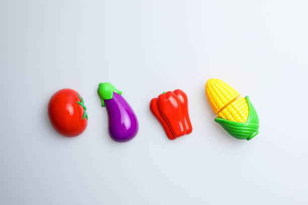 istock Fun and cute fruit children's toys. White background 1741995533