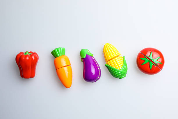 istock Fun and cute fruit children's toys. White background 1741995820