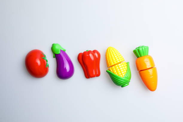 istock Fun and cute fruit children's toys. White background 1741995840