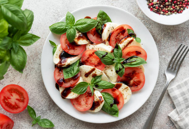 istock Caprese salad with tomatoes, mozzarella and basil. 1742005468