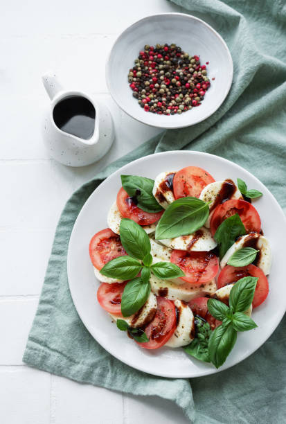 istock Caprese salad with tomatoes, mozzarella and basil. 1742005469